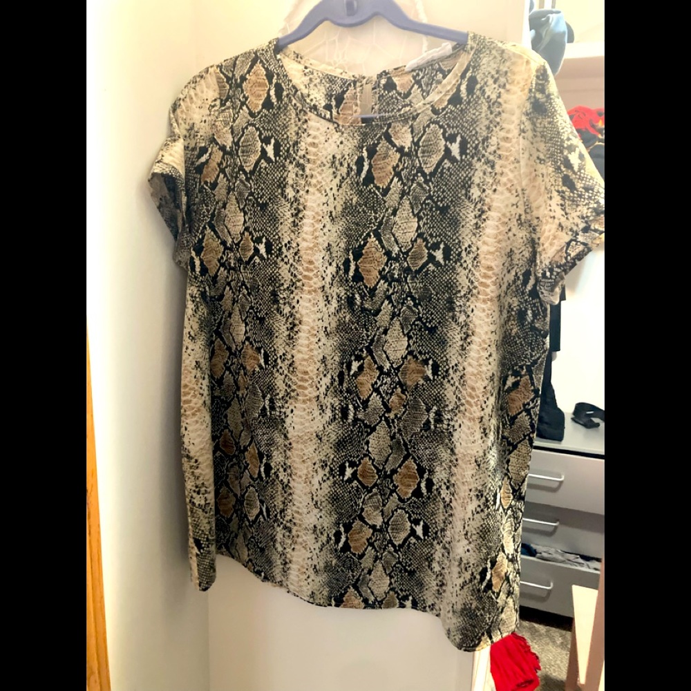 Lovely light and flattering snakeskin top